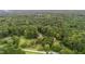 Expansive wooded property with mature trees and manicured grounds at 1017 Holly Creek Ln, Chapel Hill, NC 27516