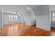 Spacious bonus room features hardwood floors, three windows, and vaulted ceilings at 1017 Holly Creek Ln, Chapel Hill, NC 27516