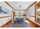 Elegant dining room with wood trim, contemporary lighting, and a neutral palette perfect for hosting memorable dinners at 1017 Holly Creek Ln, Chapel Hill, NC 27516