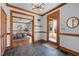 Foyer view with slate flooring leading to dining and living spaces with bright, natural light at 1017 Holly Creek Ln, Chapel Hill, NC 27516