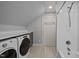 A combined laundry room and bathroom features new appliances and a tub-shower at 1017 Holly Creek Ln, Chapel Hill, NC 27516