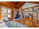 Hardwood floors and brick fireplace featured in this cozy living room at 1017 Holly Creek Ln, Chapel Hill, NC 27516