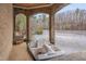 Stone boathouse featuring a pedal boat for lake access and outdoor enjoyment at 102 Anna Lake Ln, Cary, NC 27513