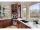 Gourmet kitchen with stainless steel appliances and a scenic view at 102 Anna Lake Ln, Cary, NC 27513