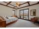 Relaxing main bedroom with a view of the lake and sliding doors for easy access at 102 Anna Lake Ln, Cary, NC 27513