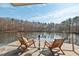 Relax on the back patio and enjoy beautiful views of the lake with your favorite beverage at 102 Anna Lake Ln, Cary, NC 27513