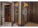Intricate wine cellar, showcasing custom shelving and ambient lighting, perfect for displaying a curated collection at 102 Anna Lake Ln, Cary, NC 27513