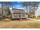 Beautiful two-story home with a well-maintained lawn and mature trees at 106 Ferris Wheel Ct, Cary, NC 27513