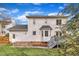 Exterior back of house, showing garden, landscaping, and deck access at 106 Ferris Wheel Ct, Cary, NC 27513