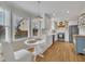 Open kitchen and breakfast nook area with lots of natural light from the bay windows at 106 Ferris Wheel Ct, Cary, NC 27513