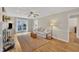 Inviting living room with hardwood floors, fireplace, and french doors to a deck at 106 Ferris Wheel Ct, Cary, NC 27513