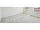 Bright bedroom features neutral carpeting, large windows, and fresh white walls at 106 Willow Cameron Way, Angier, NC 27501