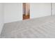 Neutral bedroom with carpeted floor and white walls providing a serene, minimalist space at 106 Willow Cameron Way, Angier, NC 27501
