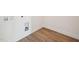 Functional laundry area with durable flooring and convenient hookups at 106 Willow Cameron Way, Angier, NC 27501