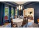 Well-lit dining room features hardwood floors, pendant lighting and large windows at 116 Wright Hill Dr, Durham, NC 27712
