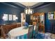 Elegant dining room with dark walls, chandelier, and hutch at 116 Wright Hill Dr, Durham, NC 27712