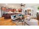 Inviting living room seamlessly connected to the gourmet kitchen with hardwood flooring throughout at 116 Wright Hill Dr, Durham, NC 27712