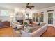 Cozy living room with fireplace and large windows, perfect for relaxing at 116 Wright Hill Dr, Durham, NC 27712