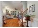 Open concept living room featuring hardwood floors and cozy fireplace at 116 Wright Hill Dr, Durham, NC 27712