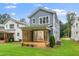 Backyard featuring a wood deck and view of the home's exterior at 1211 Chaney Rd, Raleigh, NC 27606