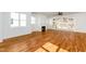 Spacious living room with a fireplace and access to the outdoor patio at 1211 Chaney Rd, Raleigh, NC 27606