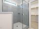 Modern tiled shower with glass door at 1245 Barreto Dr, Wendell, NC 27591