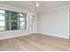 Light-filled living room with large windows and a door to an outdoor space at 1245 Barreto Dr, Wendell, NC 27591