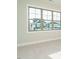 Large window offering a view of neighboring houses, set in a cozy carpeted room at 1245 Barreto Dr, Wendell, NC 27591