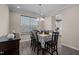 Formal dining area featuring hardwood floors, a chandelier, and large windows at 1318 Reading Ct, Burlington, NC 27217