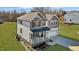 Well-kept two-story home with front porch and a two-car garage on a spacious lot at 1318 Reading Ct, Burlington, NC 27217