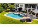 Aerial view showcasing the pool, hot tub, outdoor kitchen and patio area at 1416 Barony Lake Way, Raleigh, NC 27614