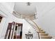 Stately foyer with grand staircase, elegant details, and high ceilings at 1416 Barony Lake Way, Raleigh, NC 27614