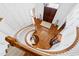Grand foyer featuring curved staircase, hardwood floors, and intricate architectural details at 1416 Barony Lake Way, Raleigh, NC 27614