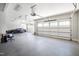 Spacious three-car garage with epoxy flooring and ample storage space at 1416 Barony Lake Way, Raleigh, NC 27614