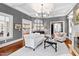 Cozy living room with elegant decor, a view to other rooms, and ample seating at 1416 Barony Lake Way, Raleigh, NC 27614