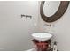 Stylish powder room features a vessel sink, wood accents, and modern faucet at 1416 Barony Lake Way, Raleigh, NC 27614