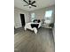 Bedroom with hardwood floors, ceiling fan and great natural light at 151 E Washington St, Coats, NC 27521