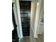 Hallway view featuring dark colored modern doors leading into other rooms in home at 151 E Washington St, Coats, NC 27521