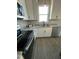 Well-equipped kitchen with granite countertops, stainless steel appliances, and modern cabinets at 151 E Washington St, Coats, NC 27521