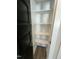 Open storage closet with empty shelves at 151 E Washington St, Coats, NC 27521