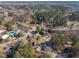 An aerial view of a neighborhood featuring well-maintained homes and lush greenery at 171 Springberry Ln, Chapel Hill, NC 27517