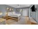 A bedroom showcasing a king-size bed, a ceiling fan, and lots of natural light at 171 Springberry Ln, Chapel Hill, NC 27517