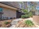 Townhome entrance with a brick facade and a landscaped walkway at 171 Springberry Ln, Chapel Hill, NC 27517