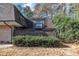 Exterior view of a townhome featuring balconies and private patio at 171 Springberry Ln, Chapel Hill, NC 27517