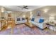 Bright living room with hardwood floors, comfortable sofas, and a view into the dining room at 171 Springberry Ln, Chapel Hill, NC 27517