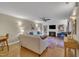 Cozy living room with hardwood floors, a fireplace, built-in bookshelves, and comfortable seating at 171 Springberry Ln, Chapel Hill, NC 27517
