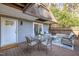 Cozy outdoor patio with comfortable seating and a stylish rug, perfect for relaxing or entertaining at 171 Springberry Ln, Chapel Hill, NC 27517