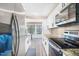 Kitchen with stainless steel appliances and ample storage at 1738 Quail Ridge Rd, Raleigh, NC 27609