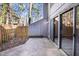 Back patio featuring a privacy fence and sliding glass doors that seamlessly blend the indoors with the outdoors at 1738 Quail Ridge Rd, Raleigh, NC 27609
