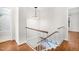 Hallway upstairs with lighting and stair access to lower floor at 1738 Quail Ridge Rd, Raleigh, NC 27609